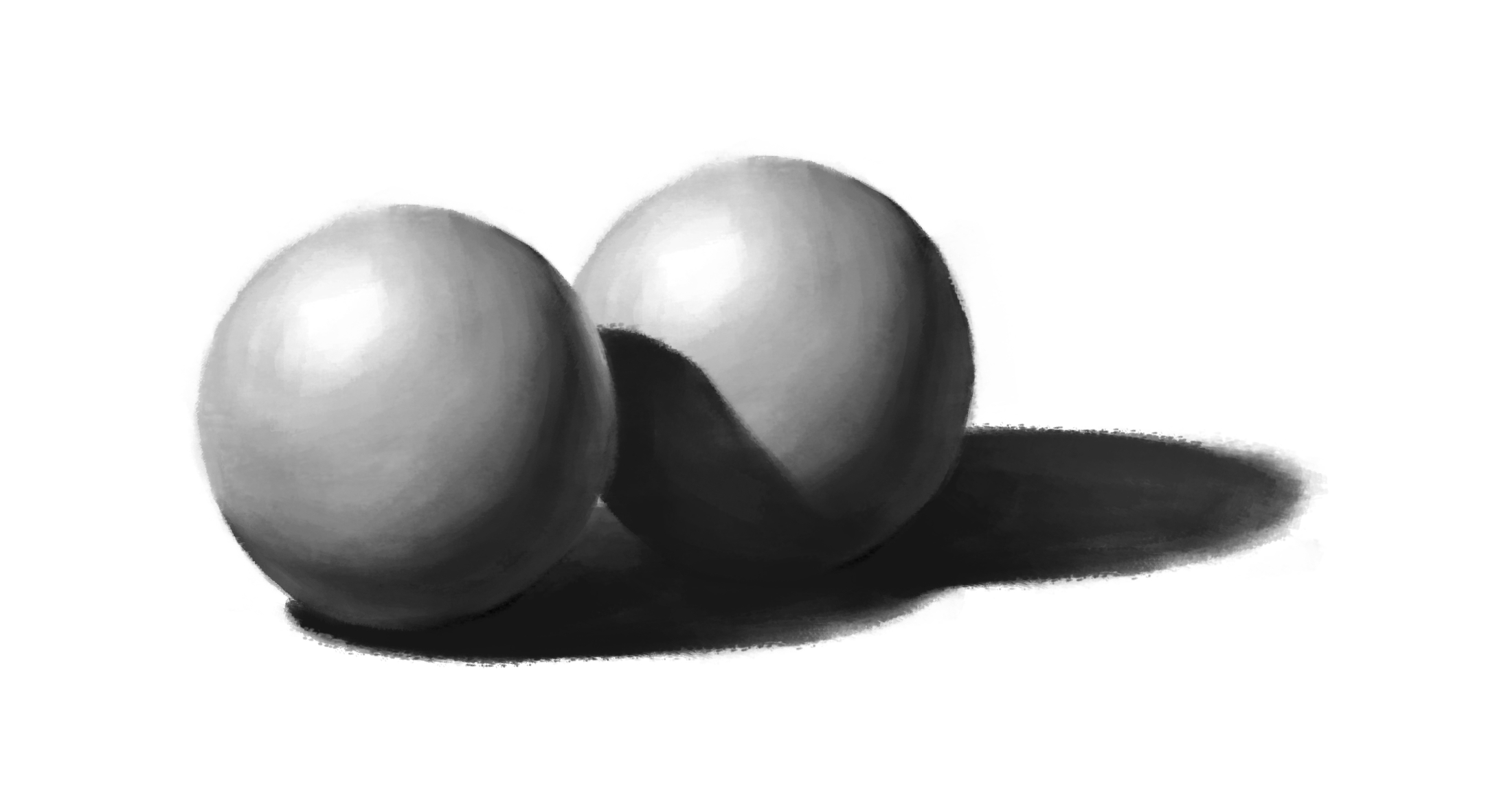 image of two shaded spheres in greyscale close to one another